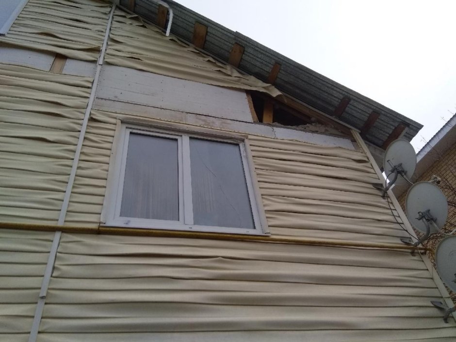 Дом обшитый плоским шифером