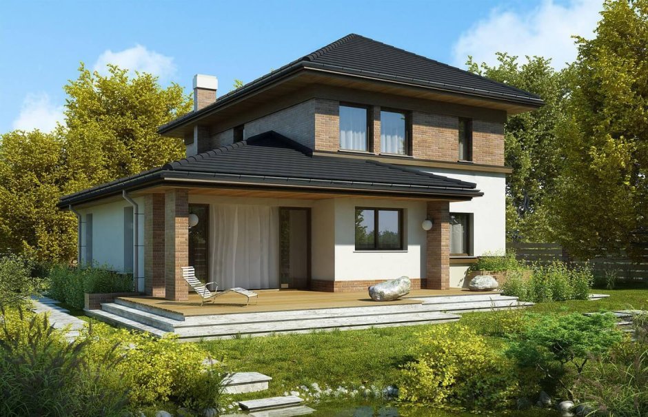 Двухэтажный дом с панорамными окнами и балконом