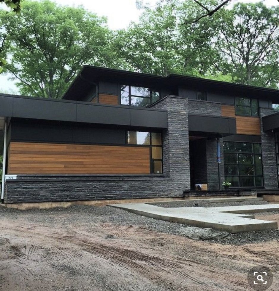 Дом черный кирпич с деревом