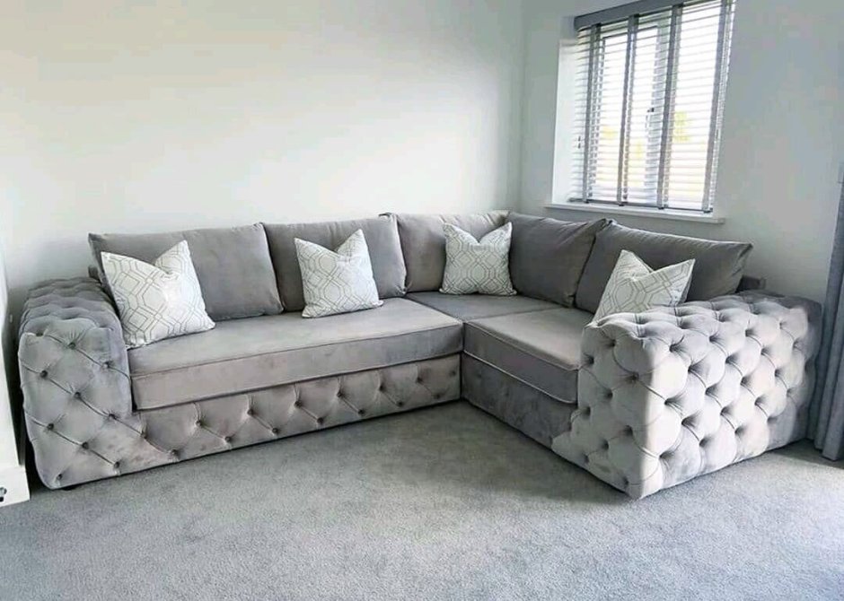 Угловой диван с каретной стяжкой