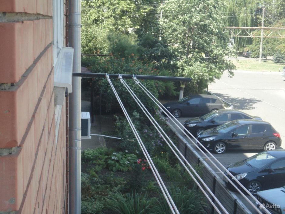 Сушилка для белья за балконом