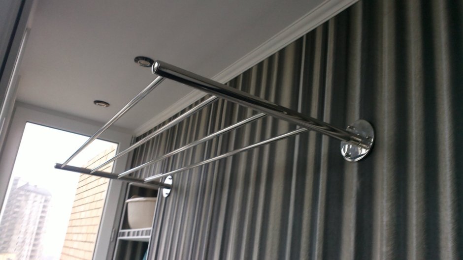 Приспособление для сушки белья на балконе