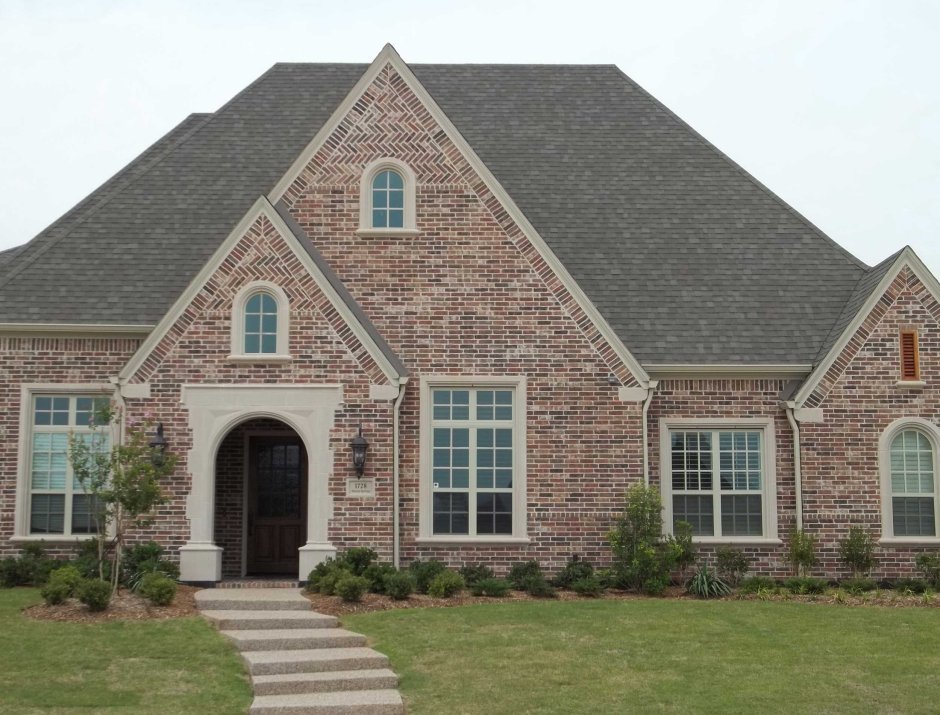 Одноэтажные дома из серого кирпича