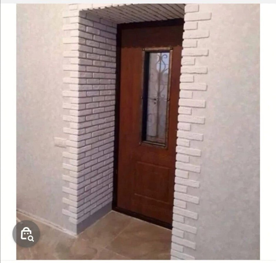 Отделка дверного проема декоративным камнем