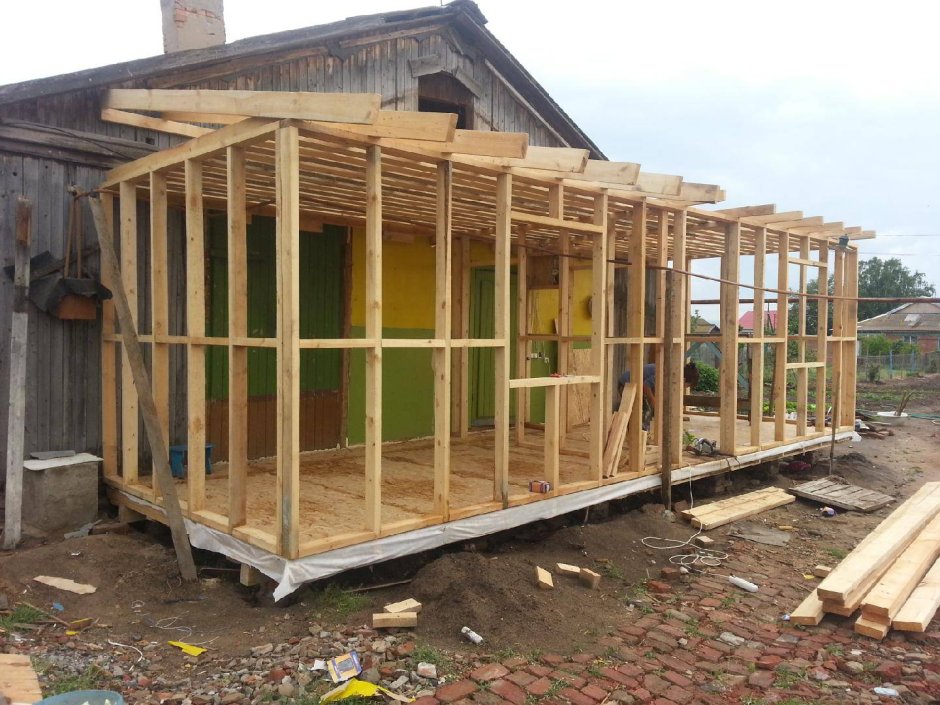 Каркасная пристройка к дому из бруса 6на2