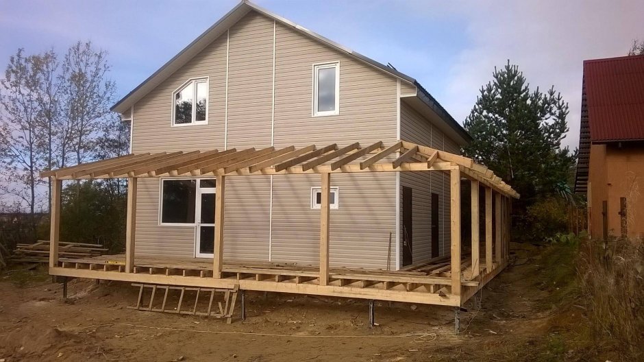 Угловая веранда к деревянному дому