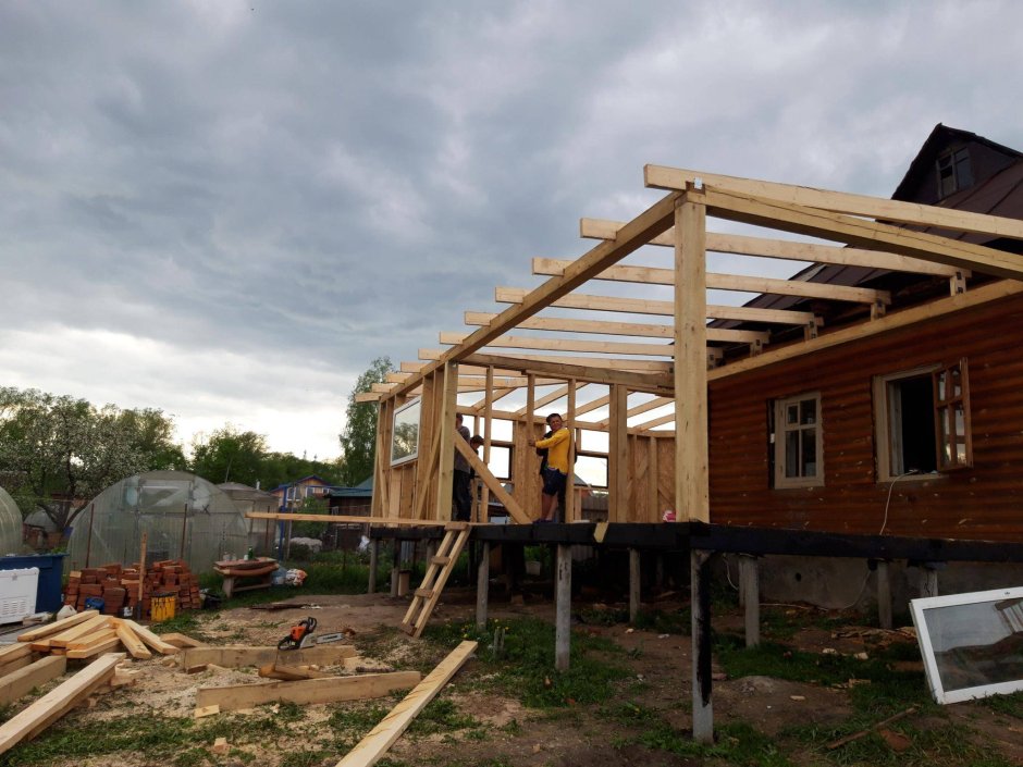 Каркасная пристройка к деревянному дому