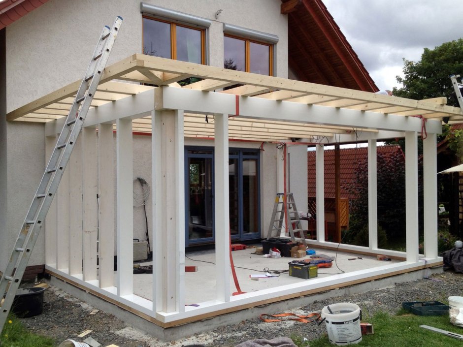 Пристройка террасы к кирпичному дому