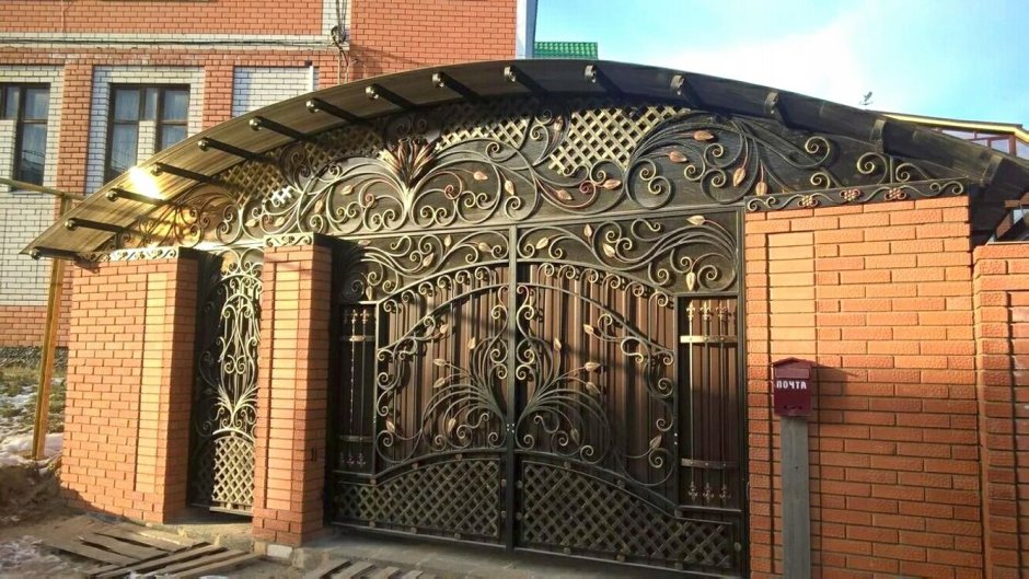 Кованые навесы над воротами