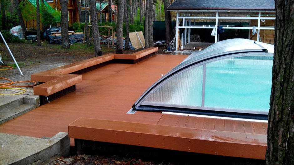 Каркасный бассейн с подиумом и навесом